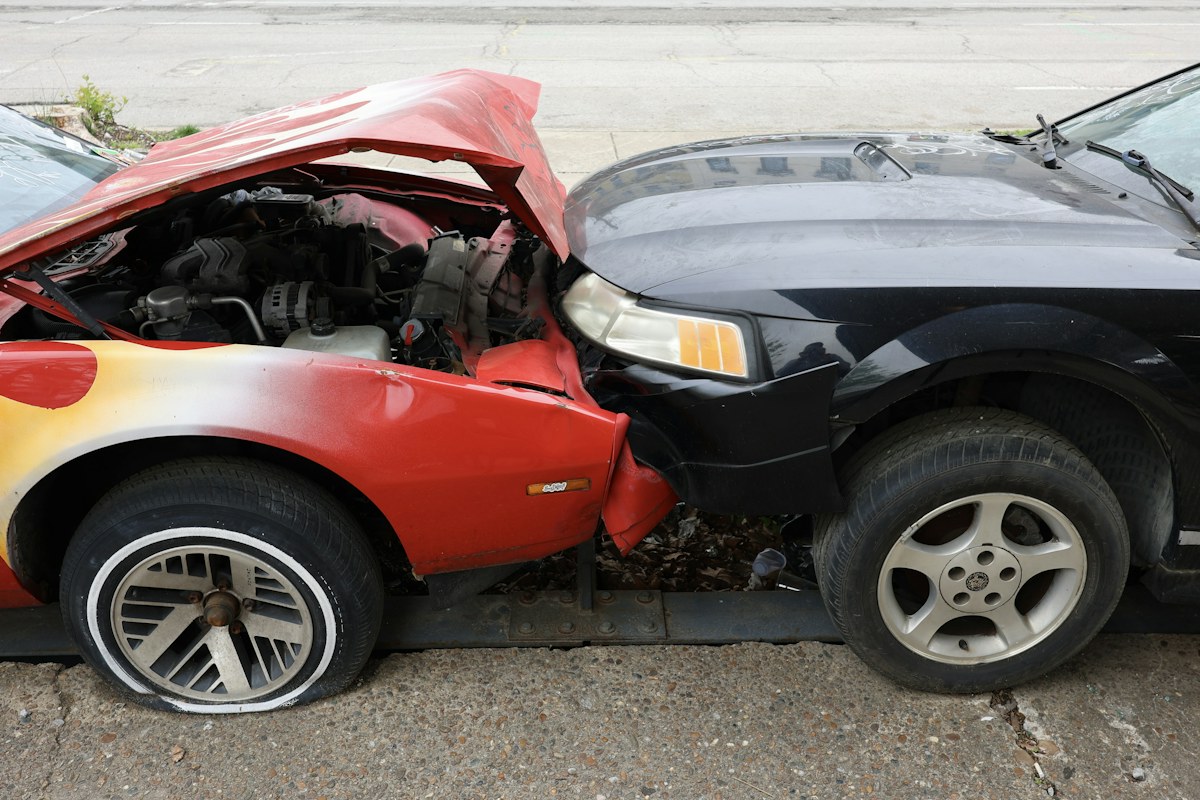 Cars are involved in a frontal collision